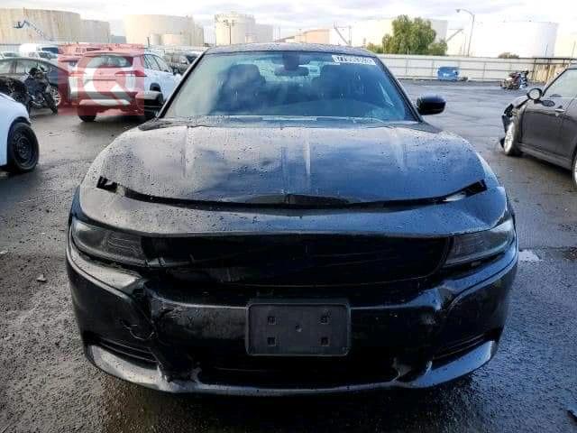 دۆج چارجەر